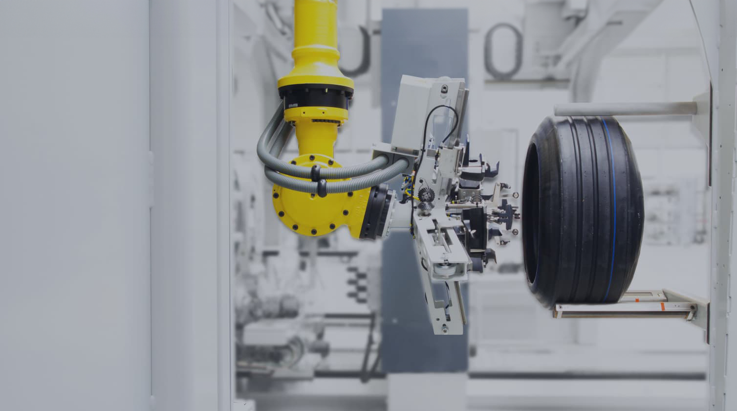 A robot arm manufacturing a wheel